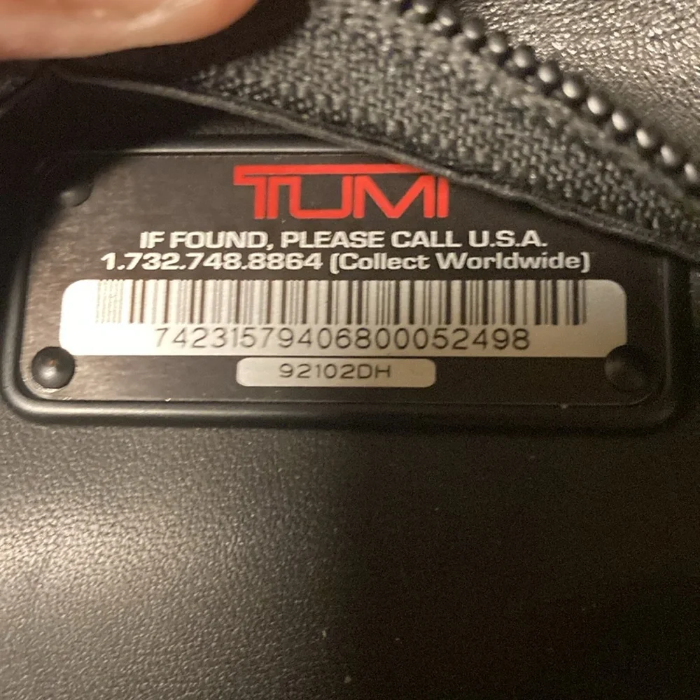 Tumi Black sholder travel-bag